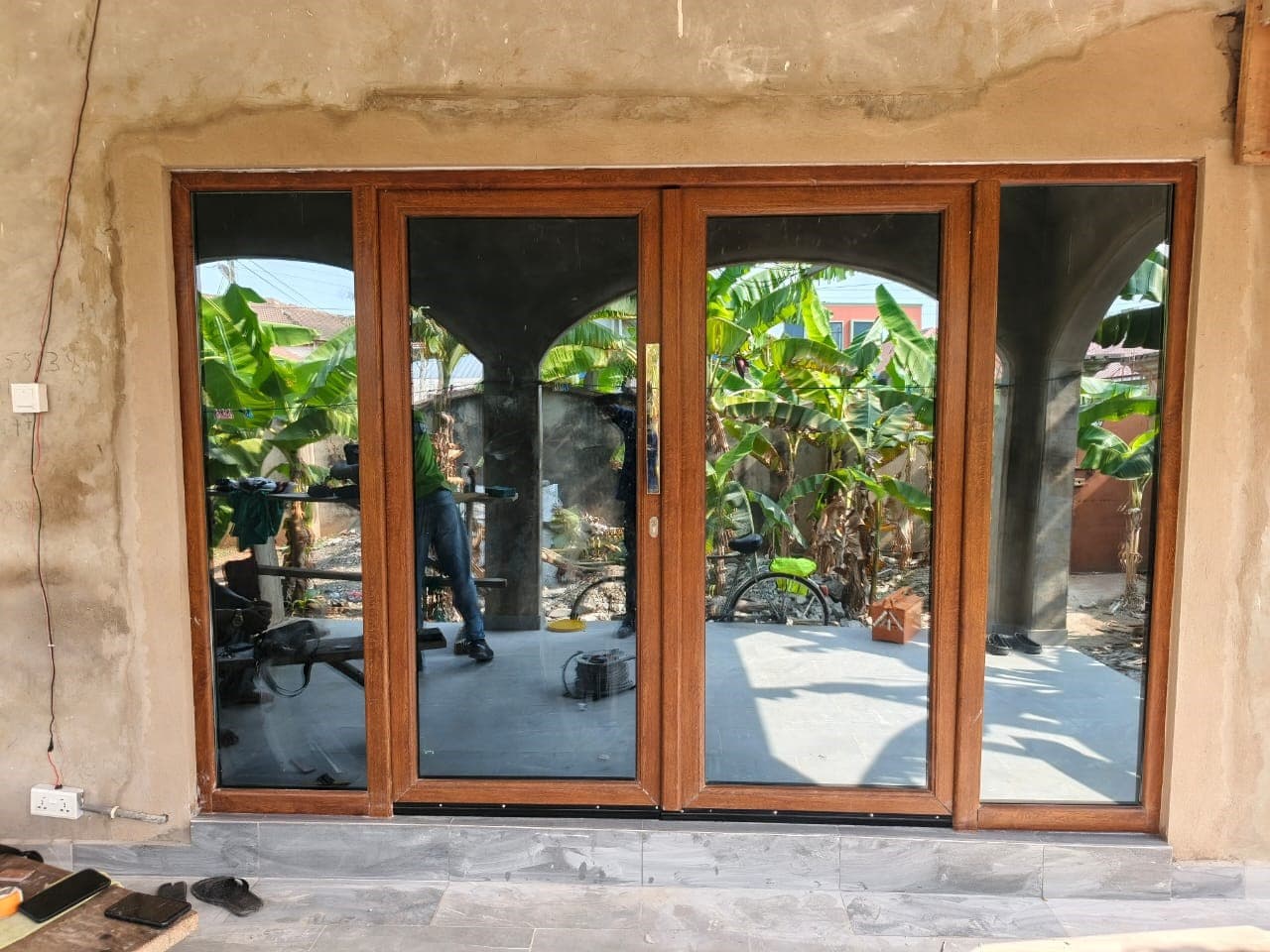 Wood-effect aluminum sliding glass doors