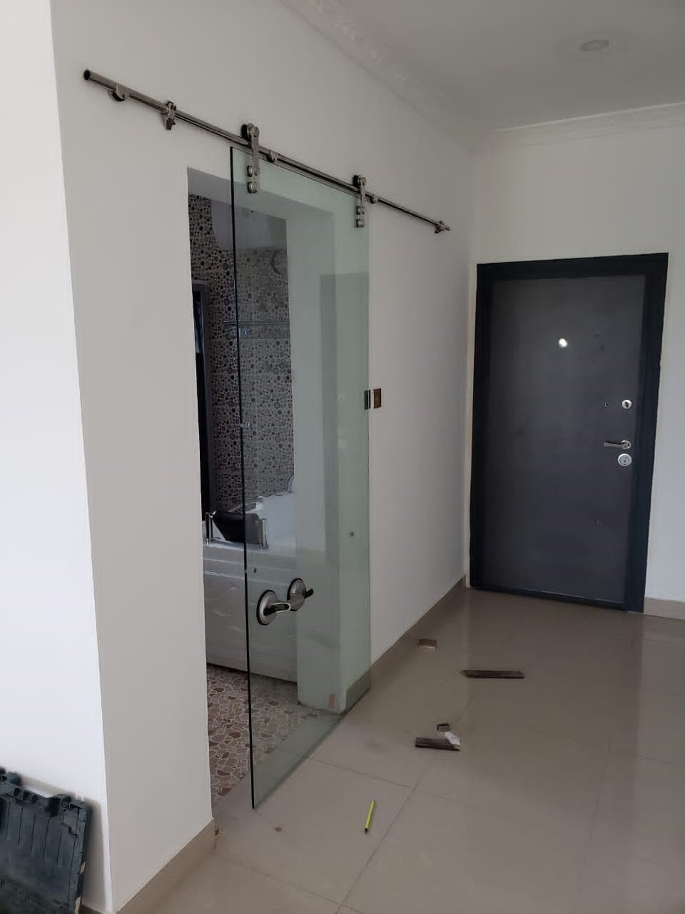 Wall-mounted frameless glass sliding door