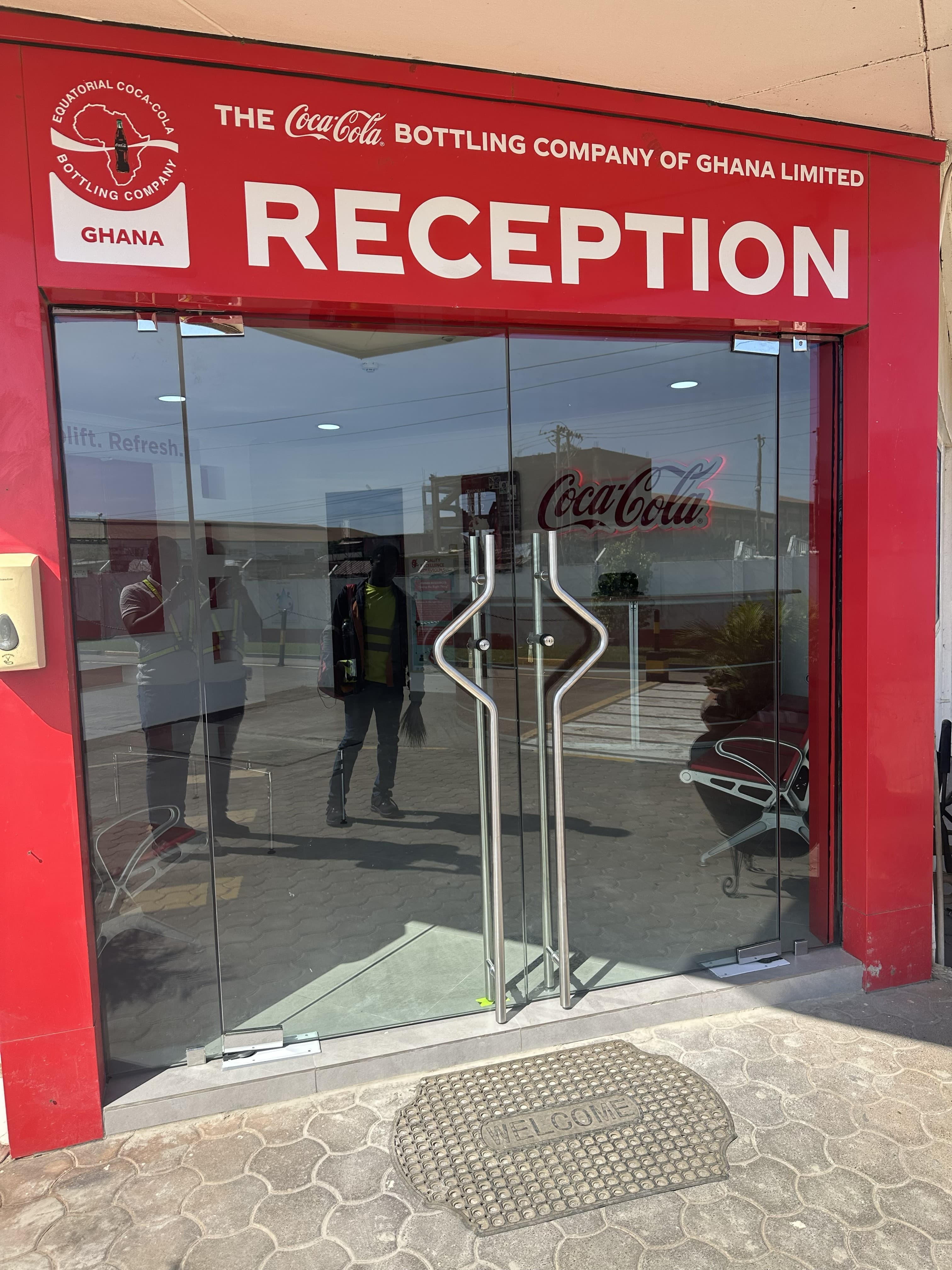 Frameless glass front entry door