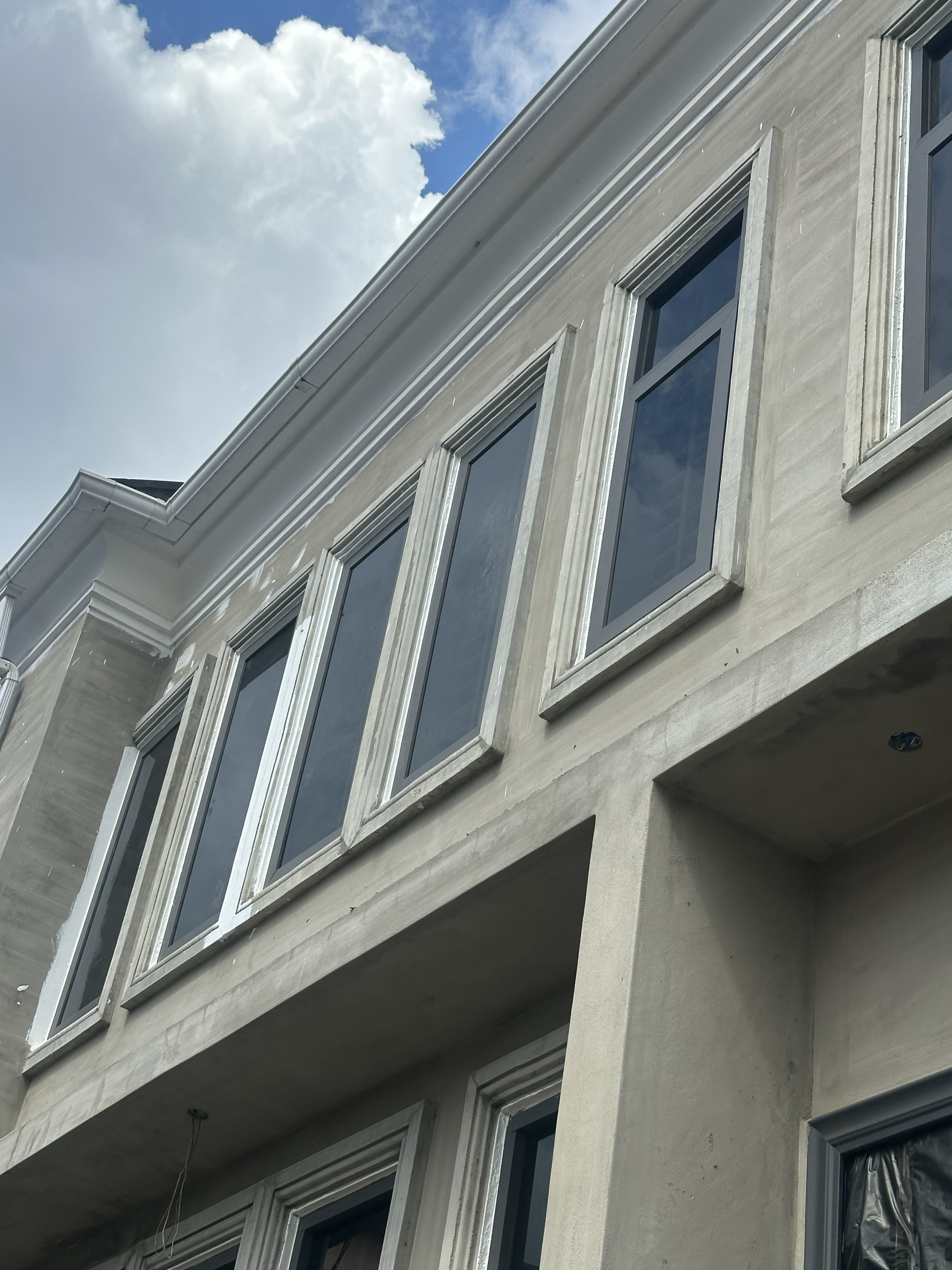 Multi-story aluminum-framed window units
